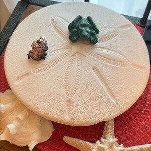 Elegant Cream Sand Dollar Sculpture with Green Frog